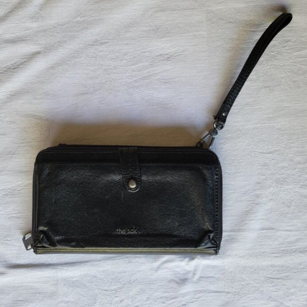 The Sak black leather wristlet/crossbody bag/wallet/phone holder